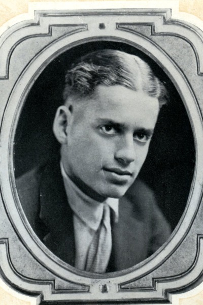 Black and white image with ornate frame around a headshot of Joe Rosenfield as a grinnell student