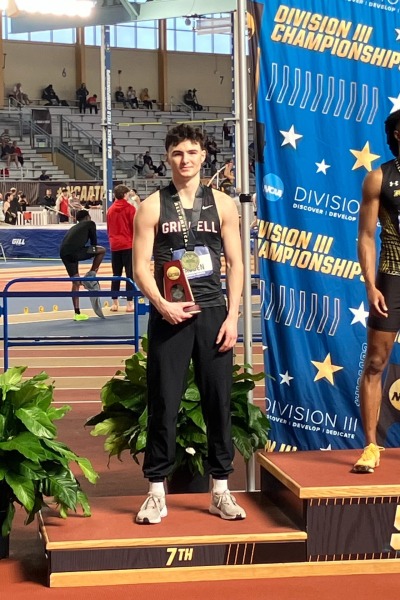 Lucas Fadden stands on the podium at Nationals